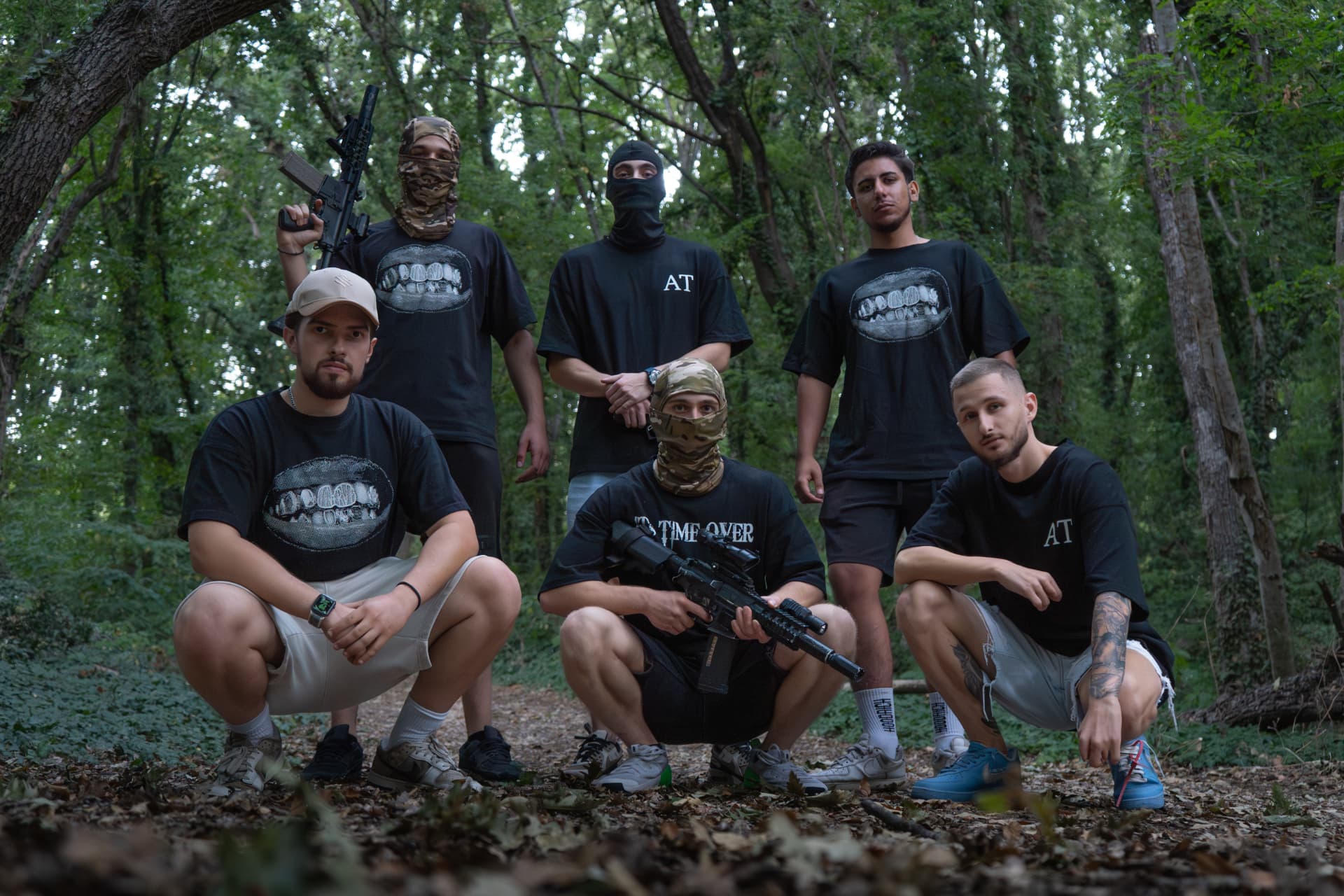ATRIX Drop 01 — group of models wearing the collection in a forest setting